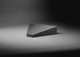 Black and white Studio photo of a granite trapezoid