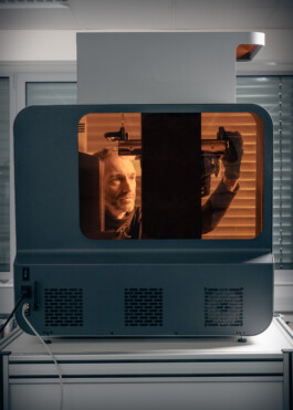 Engineer inspecting 3d print